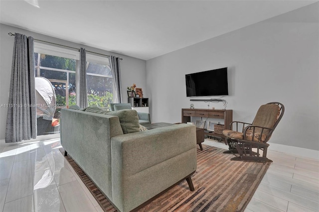 living room featuring baseboards