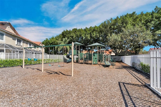 communal playground featuring fence