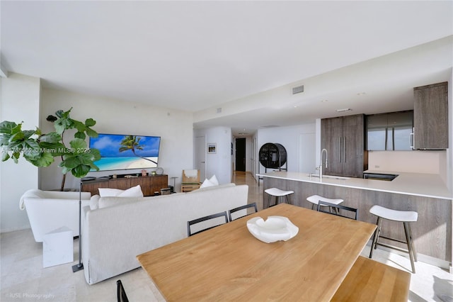 dining area featuring visible vents