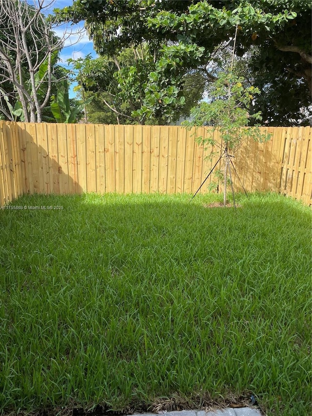 view of yard featuring fence