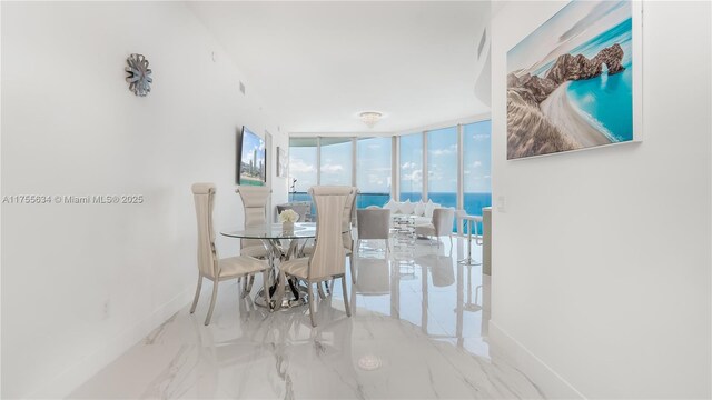 18975 Collins Ave Unit 3504, Sunny Isles Beach, FL 33160 - dining area with expansive windows and marble tiled flooring