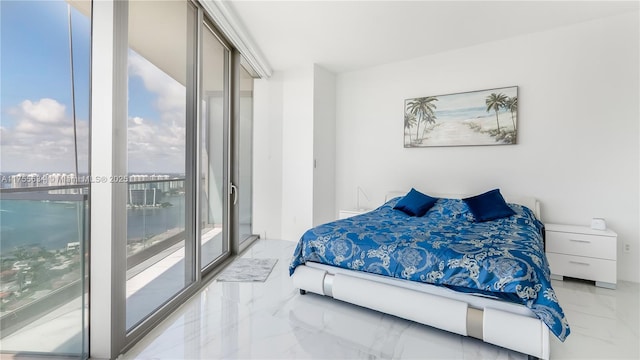 18975 Collins Ave Unit 3504, Sunny Isles Beach, FL 33160 - bedroom featuring marble tiled flooring and access to exterior