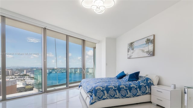 18975 Collins Ave Unit 3504, Sunny Isles Beach, FL 33160 - bedroom with expansive windows, access to outside, and light tile patterned floors