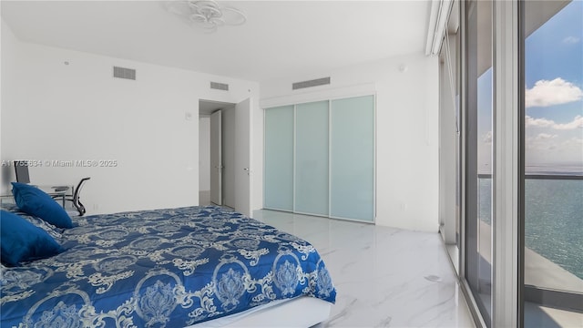 18975 Collins Ave Unit 3504, Sunny Isles Beach, FL 33160 - bedroom featuring marble finish flooring and a closet