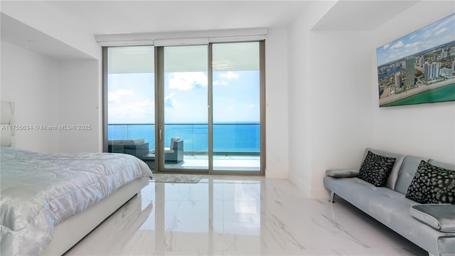 18975 Collins Ave Unit 3504, Sunny Isles Beach, FL 33160 - bedroom featuring multiple windows, marble tiled flooring, and access to exterior