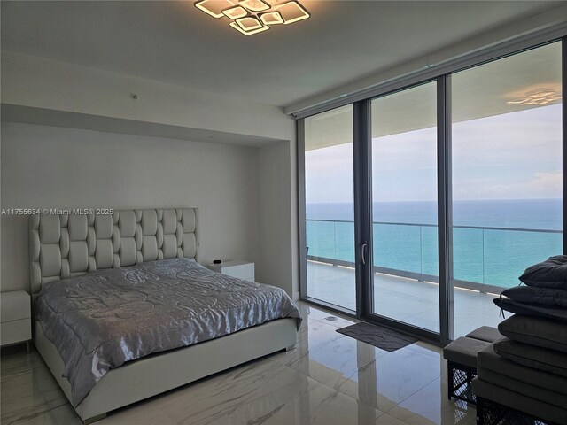18975 Collins Ave Unit 3504, Sunny Isles Beach, FL 33160 - bedroom with a wall of windows, a water view, access to outside, and light marble finish floors