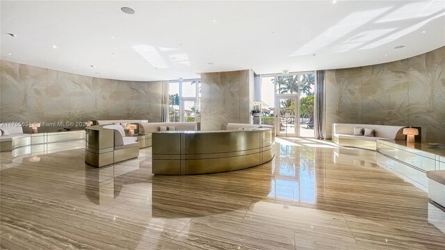 18975 Collins Ave Unit 3504, Sunny Isles Beach, FL 33160 - welcome area with wallpapered walls, a wall of windows, and french doors