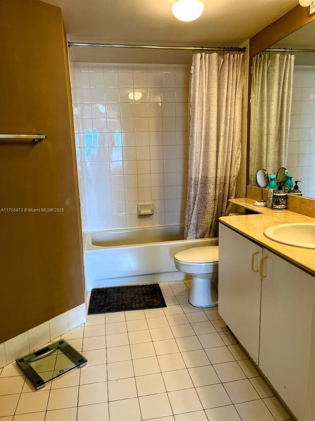 2351 Douglas Rd Unit 1109, Miami, FL 33145 - bathroom featuring tile patterned floors, shower / tub combo, vanity, and toilet
