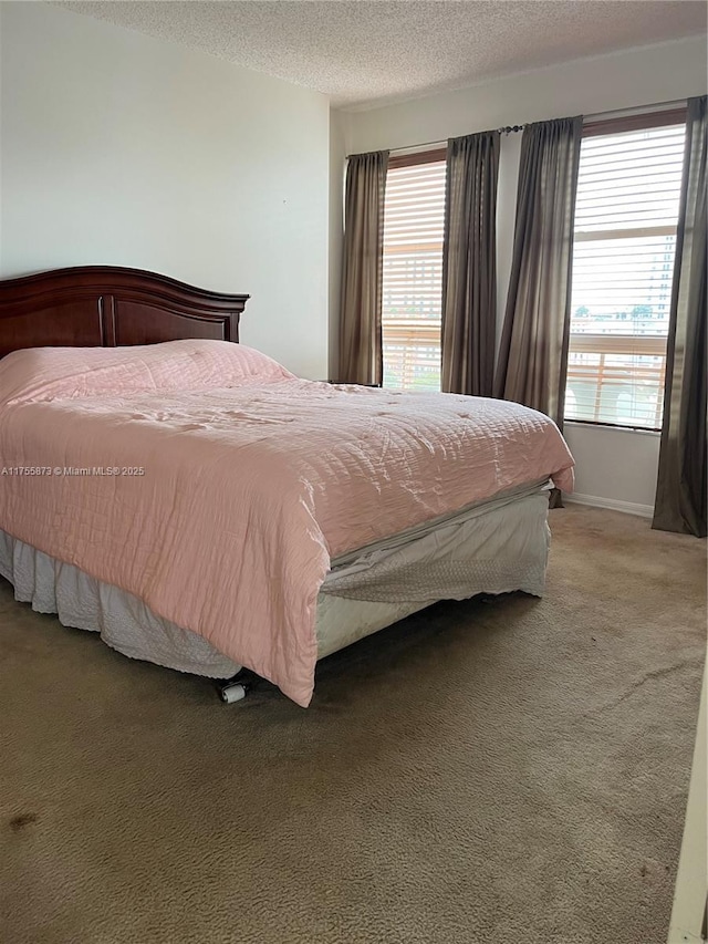 2351 Douglas Rd Unit 1109, Miami, FL 33145 - bedroom featuring light colored carpet and a textured ceiling