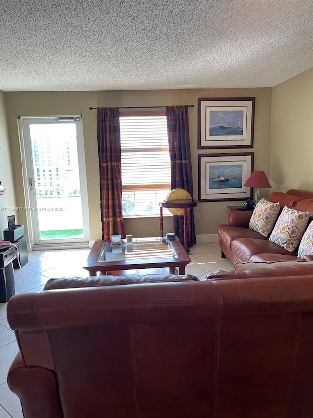 2351 Douglas Rd Unit 1109, Miami, FL 33145 - living area featuring light tile patterned flooring and a textured ceiling