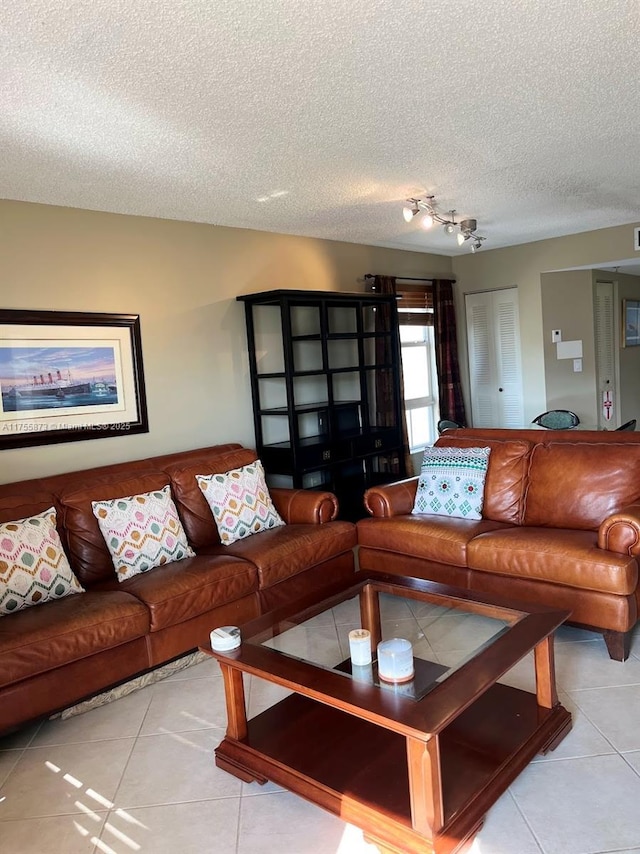 2351 Douglas Rd Unit 1109, Miami, FL 33145 - living area with tile patterned floors and a textured ceiling