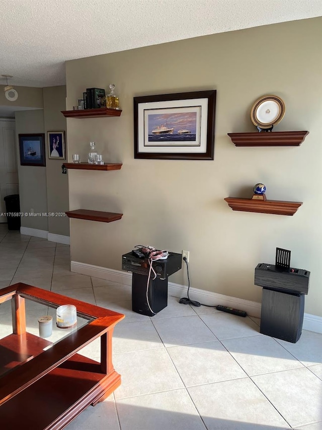 2351 Douglas Rd Unit 1109, Miami, FL 33145 - living area featuring a textured ceiling and tile patterned flooring
