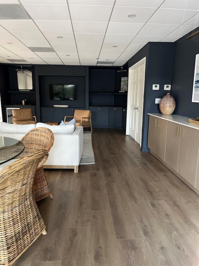 2351 Douglas Rd Unit 1109, Miami, FL 33145 - living area with a paneled ceiling and wood finished floors