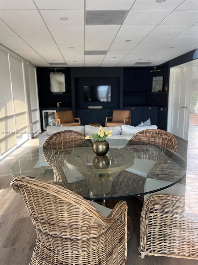 2351 Douglas Rd Unit 1109, Miami, FL 33145 - dining room with a paneled ceiling and wood finished floors