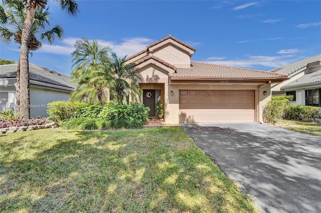 view of front of house with aphalt driveway, a tile roof, stucco siding, a front yard, and a garage