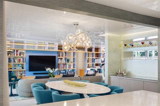 dining space with a notable chandelier