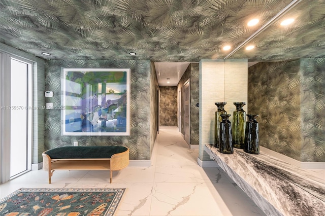 interior space featuring marble finish floor