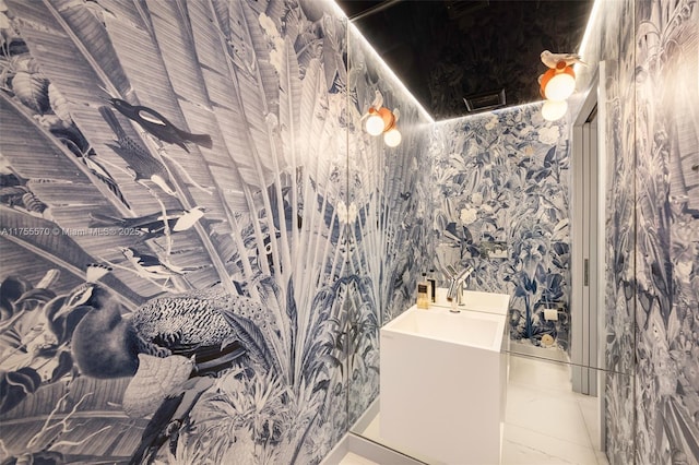 bathroom featuring marble finish floor