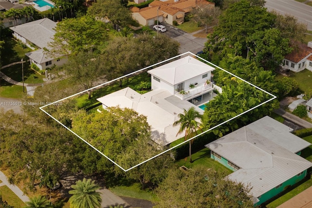 birds eye view of property with a residential view