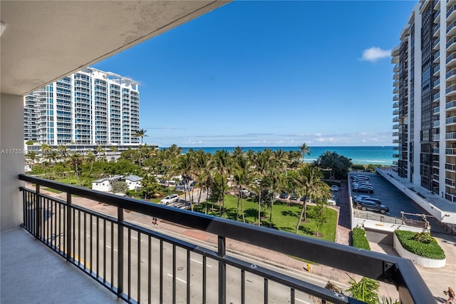 balcony featuring a water view