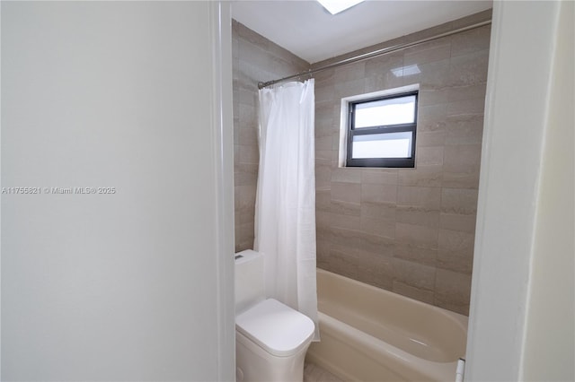 full bath with shower / bath combo and toilet