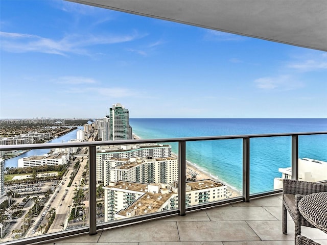 balcony with a city view and a water view