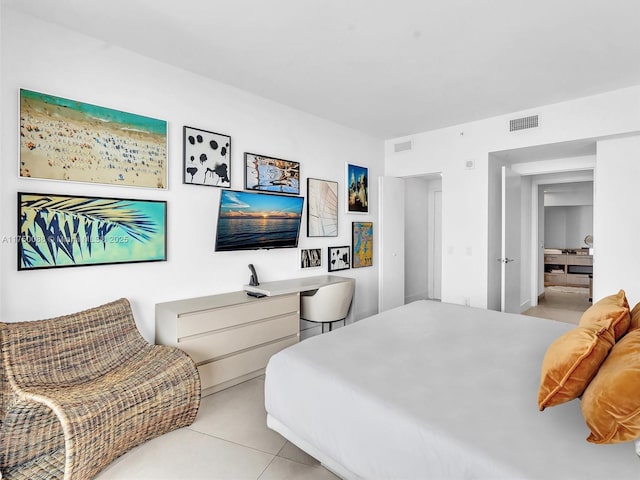 bedroom featuring visible vents and light tile patterned flooring