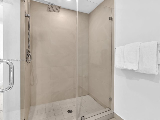 full bath featuring a shower stall