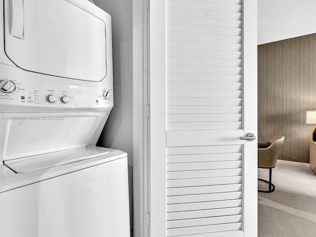 laundry room with laundry area and stacked washing maching and dryer