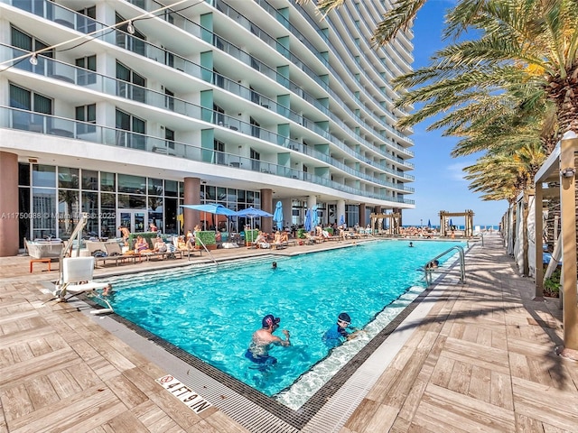 pool featuring a patio area