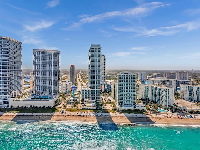 view of city with a view of the beach and a water view