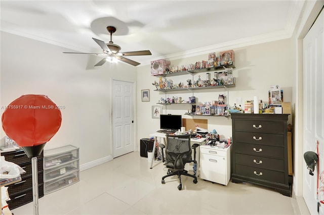 office space featuring ceiling fan, ornamental molding, and baseboards