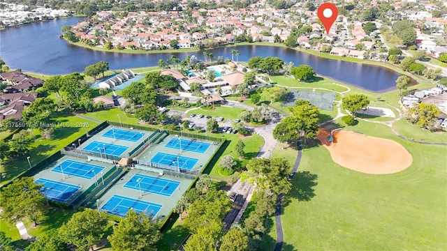 bird's eye view featuring a residential view and a water view