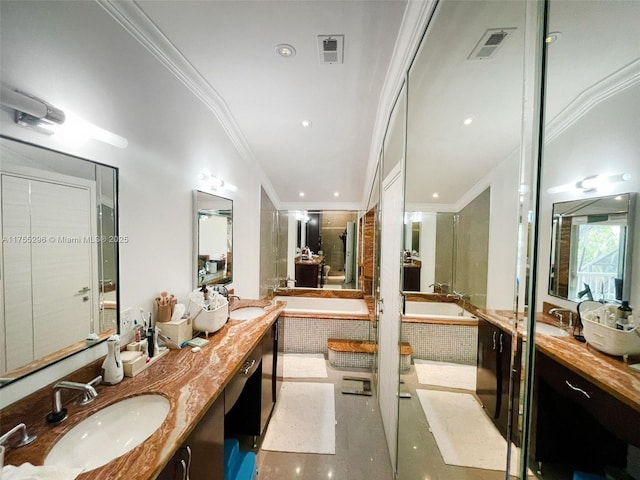 full bath with a garden tub, visible vents, a sink, and ornamental molding