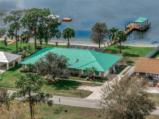 drone / aerial view with a water view