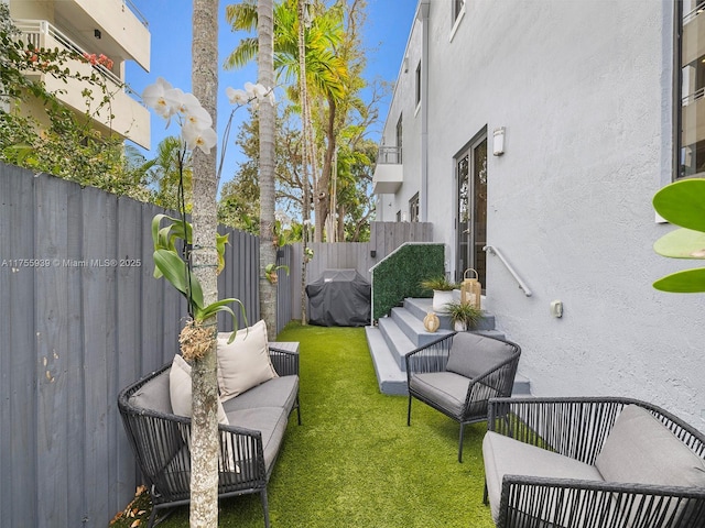 view of yard with an outdoor hangout area and a fenced backyard