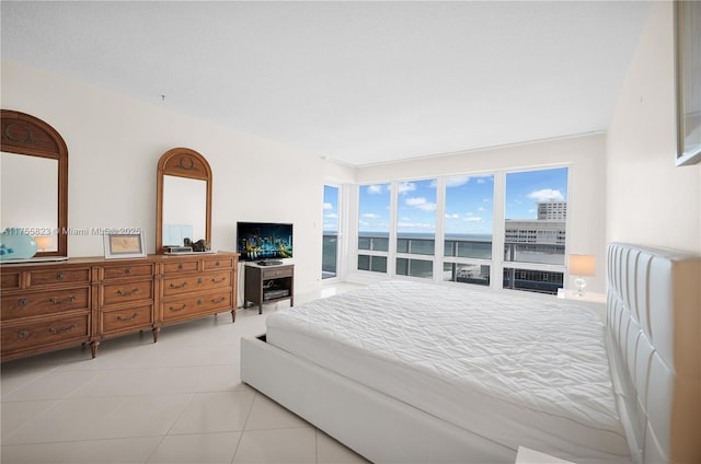 bedroom featuring light tile patterned floors