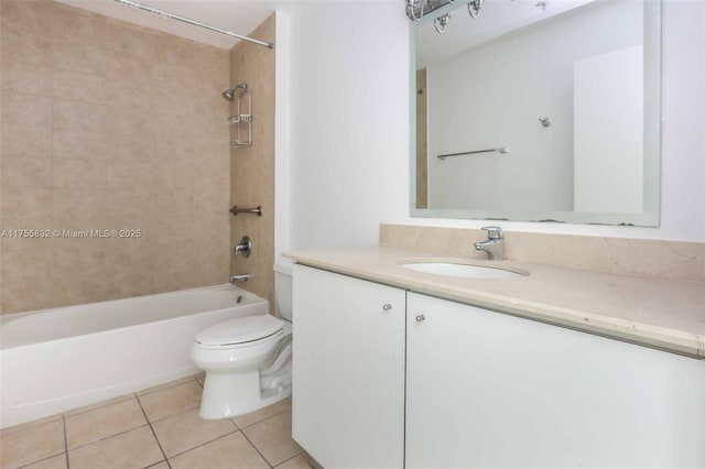 bathroom featuring toilet, vanity, tub / shower combination, and tile patterned floors