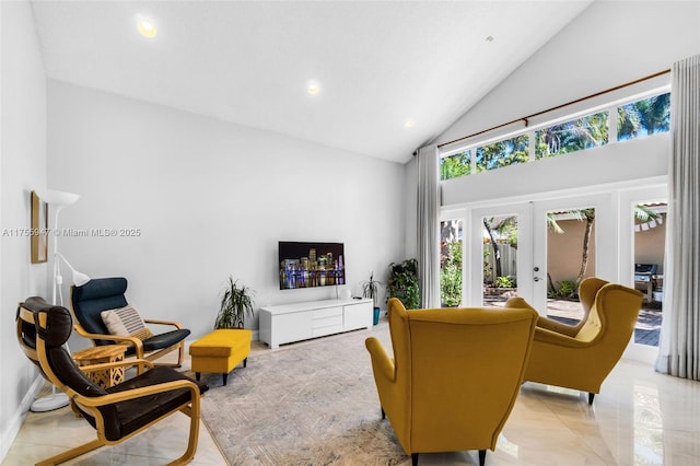 living room with recessed lighting, high vaulted ceiling, and french doors