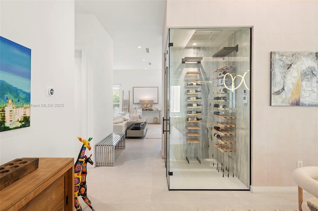 wine cellar featuring tile walls and tile patterned floors