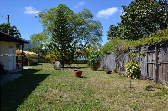 view of yard with fence