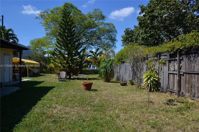 view of yard featuring fence