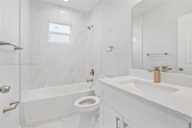 full bathroom featuring toilet, marble finish floor, shower / washtub combination, and vanity