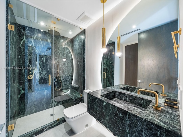 full bath with visible vents, a marble finish shower, toilet, and vanity