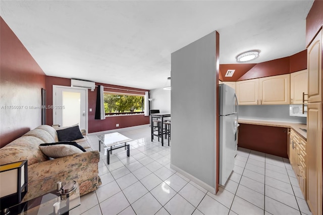 living room featuring baseboards, light tile patterned flooring, and a wall mounted AC