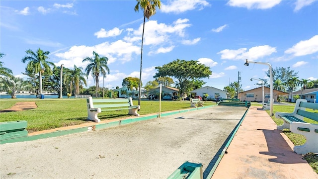 view of road featuring a residential view and street lights