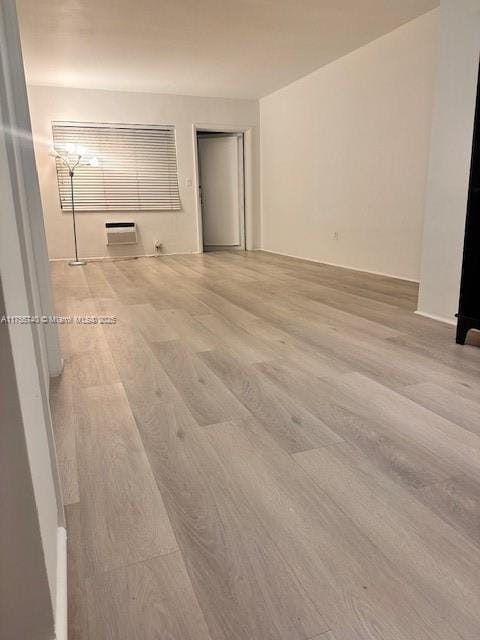 unfurnished bedroom featuring wood finished floors