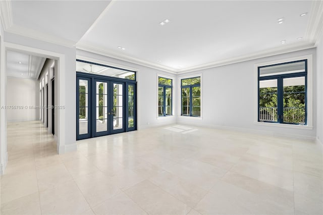 unfurnished room with french doors, crown molding, baseboards, and light tile patterned floors