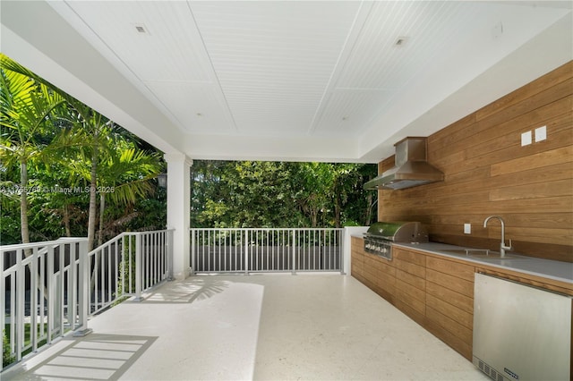 view of patio / terrace featuring exterior kitchen, area for grilling, and a sink