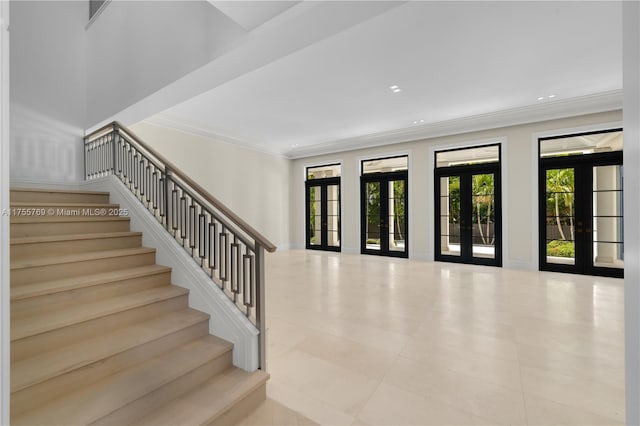 tiled foyer entrance with recessed lighting, french doors, crown molding, and stairs